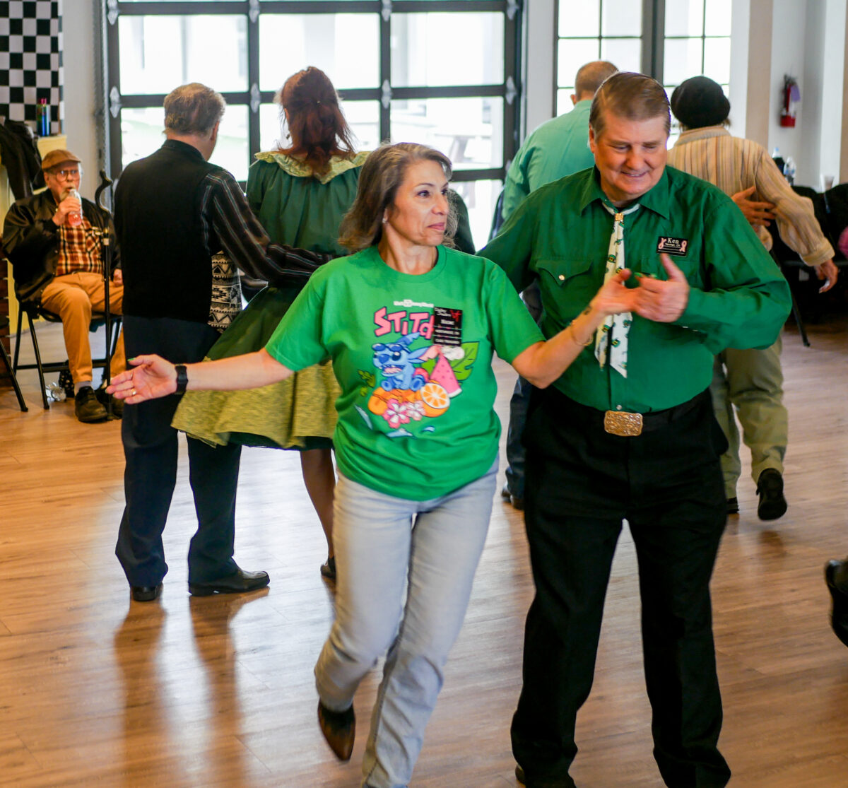 Sierra Hillbillies Lucky Leprechaun's Dance had attendees square dancing with multiple partners while Phil Farmer sang and called out square dancing movements for them to follow on Sunday at the Valencia United Methodist Church. Katherine Quezada/The Signal
